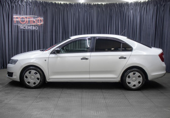 Подержанный автомобиль Skoda Rapid Liftback 2014 года (8 фото)