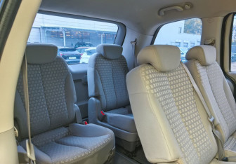 Подержанный автомобиль Kia Carnival 2009 года (14 фото)
