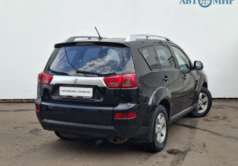 Подержанный автомобиль Peugeot 4007 2011 года (5 фото)