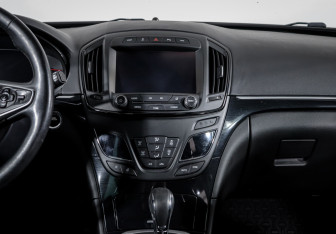 Подержанный автомобиль Opel Insignia Wagon 2015 года (13 фото)