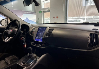 Подержанный автомобиль Kia Sportage 2010 года (10 фото)