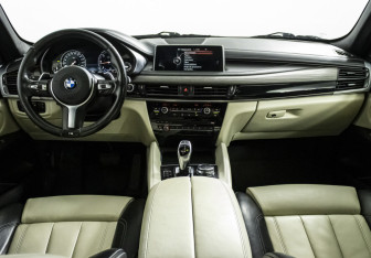 Подержанный автомобиль BMW X6 2015 года (14 фото)