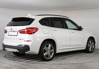Подержанный автомобиль BMW X1 2018 года (2 фото)