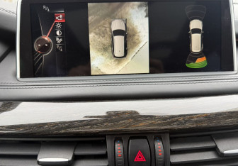 Подержанный автомобиль BMW X5 2014 года (15 фото)