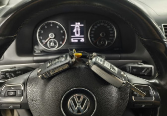 Подержанный автомобиль Volkswagen Touran 2013 года (16 фото)