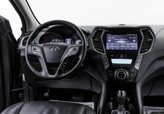 Подержанный автомобиль Hyundai Santa Fe 2014 года (9 фото)