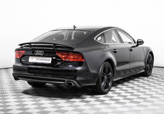 Подержанный автомобиль Audi A7 2014 года (5 фото)