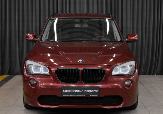 Подержанный автомобиль BMW X1 2011 года (2 фото)