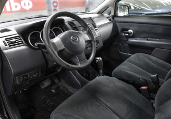 Подержанный автомобиль Nissan Tiida Sedan 2011 года (16 фото)