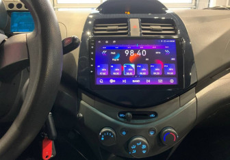 Подержанный автомобиль Chevrolet Spark 2012 года (13 фото)