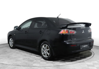Подержанный автомобиль Mitsubishi Lancer Sedan 2011 года (7 фото)