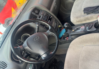Подержанный автомобиль Hyundai Santa Fe 2011 года (11 фото)