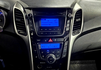 Подержанный автомобиль Hyundai i30 Hatchback 2014 года (13 фото)