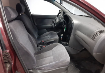 Подержанный автомобиль Kia Spectra Sedan 2007 года (16 фото)