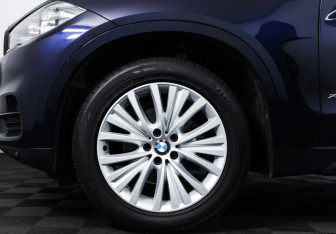 Подержанный автомобиль BMW X5 2016 года (27 фото)