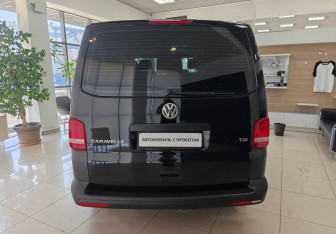 Подержанный автомобиль Volkswagen Caravelle 2014 года (6 фото)