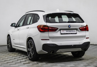 Подержанный автомобиль BMW X1 2015 года (7 фото)