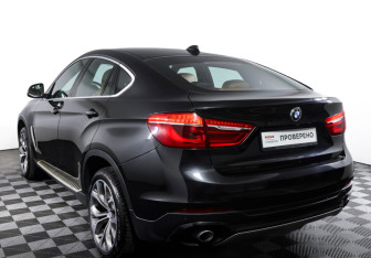 Подержанный автомобиль BMW X6 2014 года (7 фото)