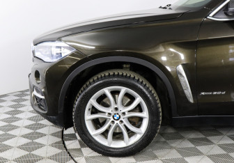 Подержанный автомобиль BMW X6 2015 года (8 фото)