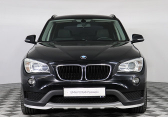 Подержанный автомобиль BMW X1 2014 года (3 фото)