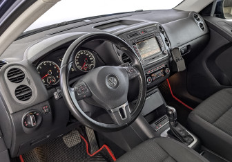 Подержанный автомобиль Volkswagen Tiguan 2013 года (15 фото)