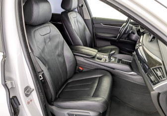 Подержанный автомобиль BMW X6 2019 года (24 фото)