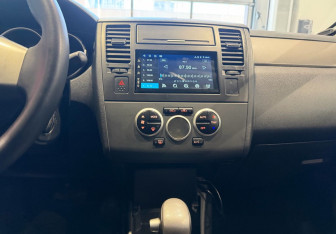 Подержанный автомобиль Nissan Tiida Hatchback 2010 года (16 фото)