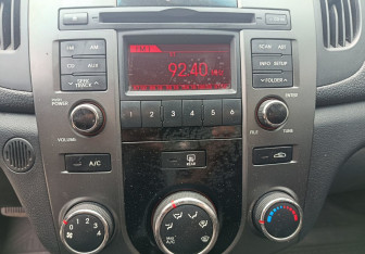 Подержанный автомобиль Kia Cerato Sedan 2010 года (14 фото)