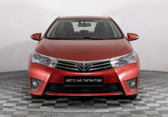 Подержанный автомобиль Toyota Corolla Sedan 2014 года (2 фото)
