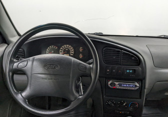 Подержанный автомобиль Kia Spectra Sedan 2007 года (18 фото)