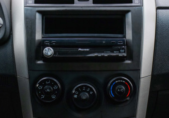 Подержанный автомобиль Toyota Corolla Sedan 2008 года (14 фото)