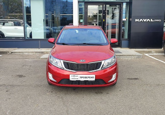 Подержанный автомобиль Kia Rio Hatchback 2014 года (2 фото)