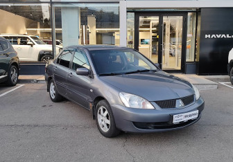 Подержанный автомобиль Mitsubishi Lancer Sedan 2005 года (3 фото)