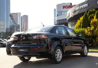 Подержанный автомобиль Mitsubishi Lancer Sedan 2014 года (3 фото)