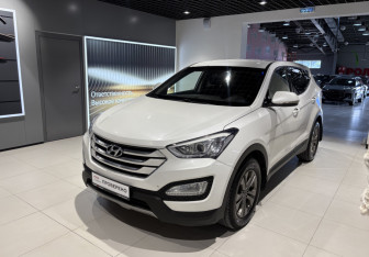 Подержанный автомобиль Hyundai Santa Fe 2014 года (2 фото)