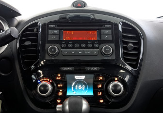 Подержанный автомобиль Nissan Juke 2014 года (17 фото)