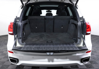 Подержанный автомобиль BMW X5 2014 года (10 фото)
