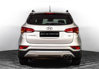 Подержанный автомобиль Hyundai Santa Fe 2015 года (4 фото)