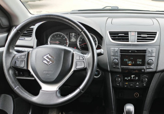 Подержанный автомобиль Suzuki Swift Hatchback 2013 года (9 фото)