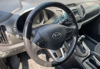 Подержанный автомобиль Kia Sportage 2013 года (14 фото)