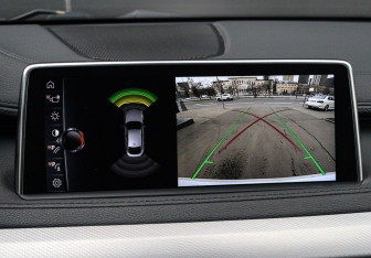 Подержанный автомобиль BMW X6 2016 года (12 фото)