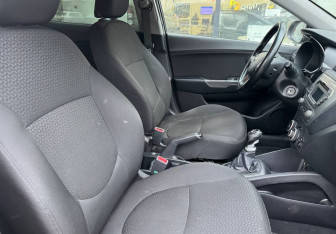 Подержанный автомобиль Kia Rio Sedan 2014 года (10 фото)