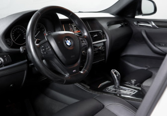 Подержанный автомобиль BMW X4 2014 года (14 фото)