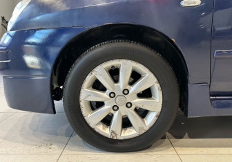 Подержанный автомобиль Suzuki Liana Wagon 2005 года (18 фото)