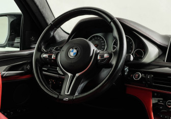 Подержанный автомобиль BMW X6 M 2015 года (14 фото)