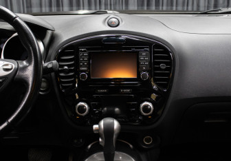 Подержанный автомобиль Nissan Juke 2014 года (15 фото)