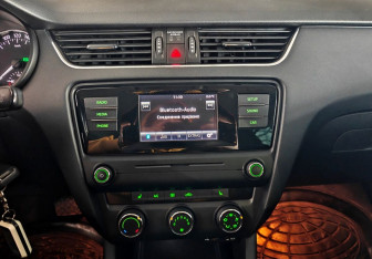 Подержанный автомобиль Skoda Octavia Liftback 2014 года (14 фото)