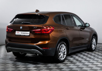 Подержанный автомобиль BMW X1 2015 года (5 фото)
