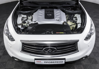Подержанный автомобиль Infiniti QX70 2015 года (9 фото)