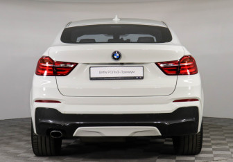 Подержанный автомобиль BMW X4 2015 года (4 фото)